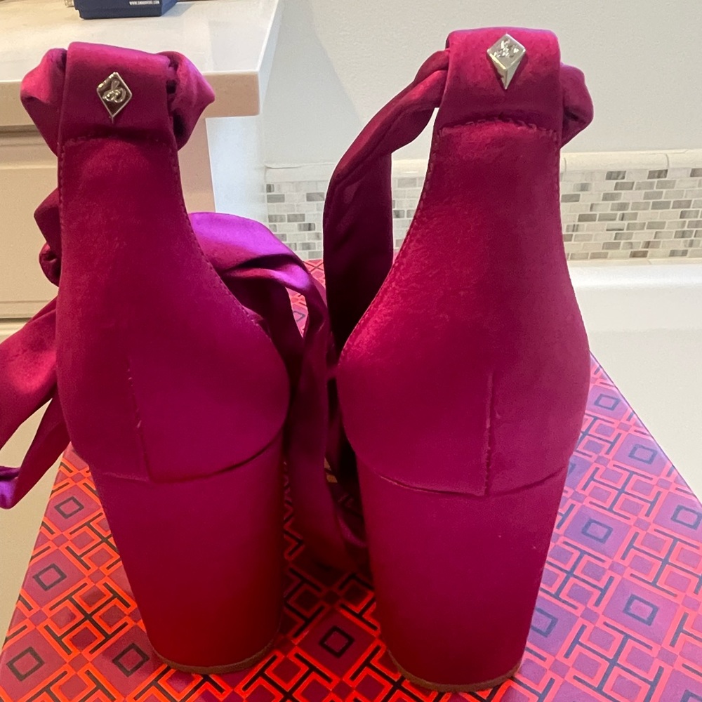 Pink semi-satin heels with satin ribbon. never worn.